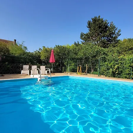 With Garden And Shared Pool